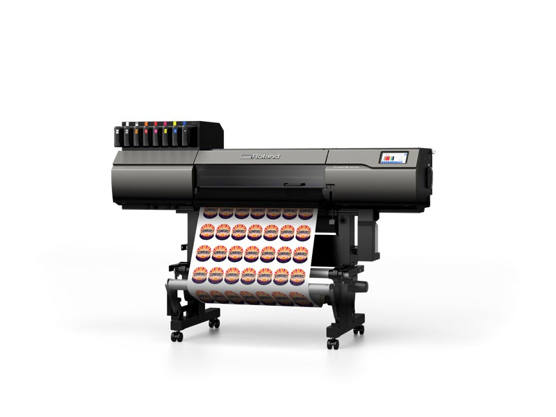 Roland TrueVIS MG2-300 UV printer/cutter, angled view, printing a roll of stickers