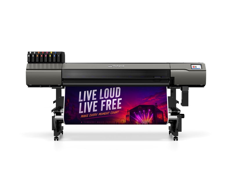 Roland TrueVIS MG2-640 64-inch UV printer/cutter, front view, printing a wide banner